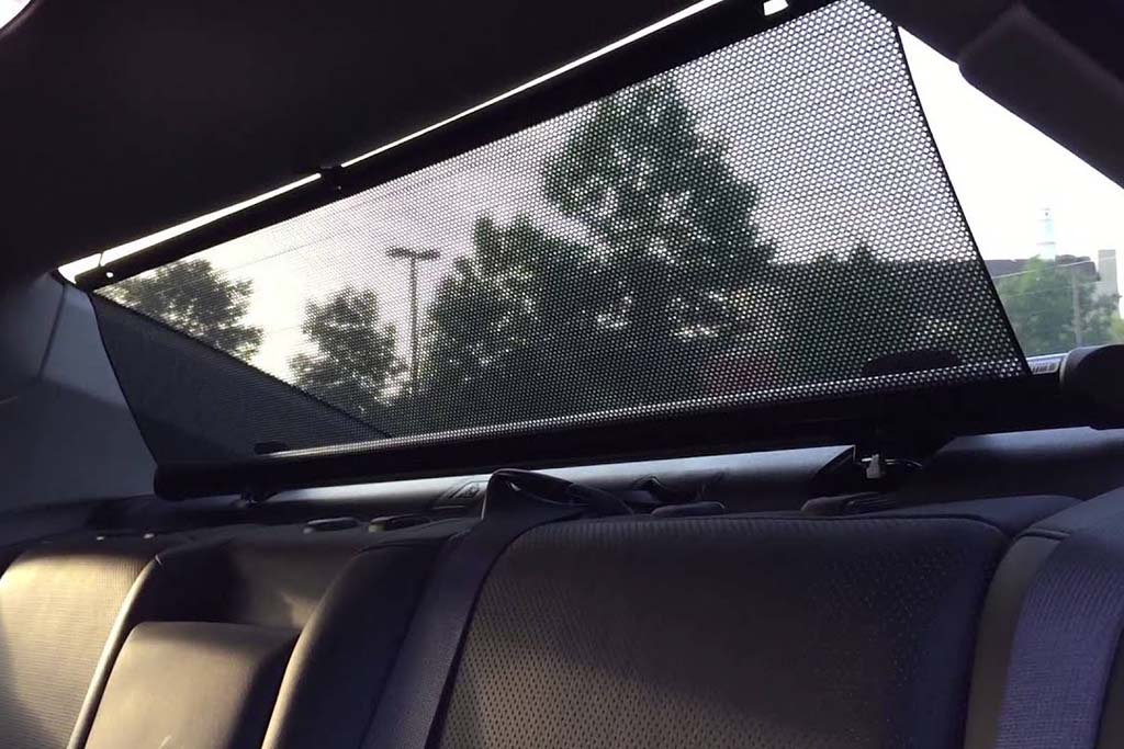 back window shade cloth vs window tinting